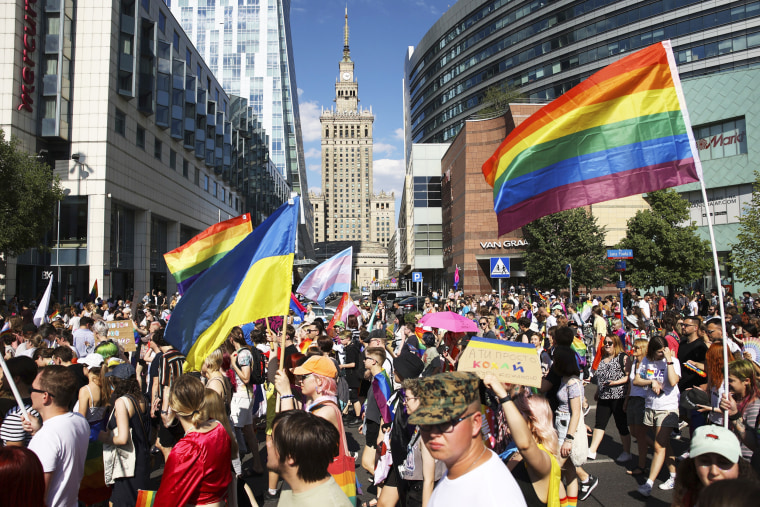 People march during KyivPride and the Warsaw Equality Parade
