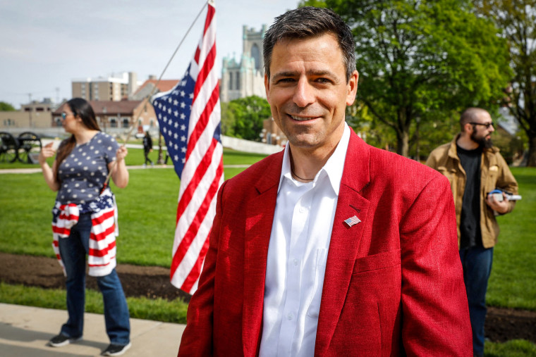 Image: Ryan Kelley, Republican candidate for Governor, attends a Freedom Rally in support of First Amendment rights and to protest against Governor Gretchen Whitmer, outside the Michigan State Capitol in Lansing, Mich., on May 15, 2021.
