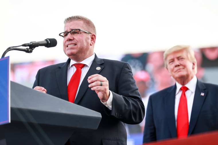 Illinois gubernatorial hopeful Darren Bailey speaks after receiving an endorsement from former President Donald Trump on June 25, 2022, in Mendon, Ill.