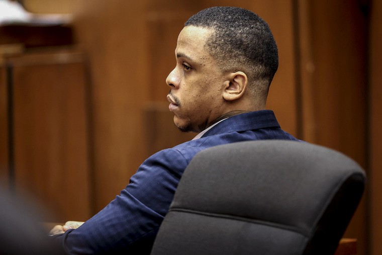 Image: Defendant Eric Holder listens during opening statements in his murder trial on June 15, 2022, at Los Angeles Superior Court.