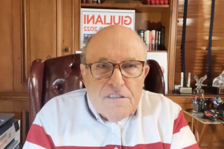 Rudy Giuliani speaks via Facebook Live to address a slapping incident during a fundraising event with his son Andrew on Sunday in Staten Island, N.Y.