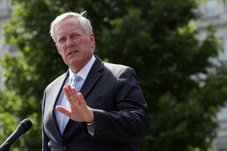 Image: Then-White House Chief of Staff Mark Meadows speaks to reporters outside the West Wing of the White House on Aug. 28, 2020.