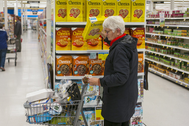 Image: A customer shops for Cheerios cereal at a supermarket in South Burlington, Vt., on Nov. 6, 2017.
