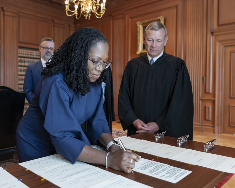 Signing the Oaths of Office
