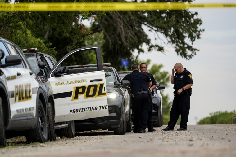 Image: Police at a scene where officials say dozens of people have been found dead and multiple others were taken to hospitals with heat-related illnesses on June 28, 2022, in San Antonio.