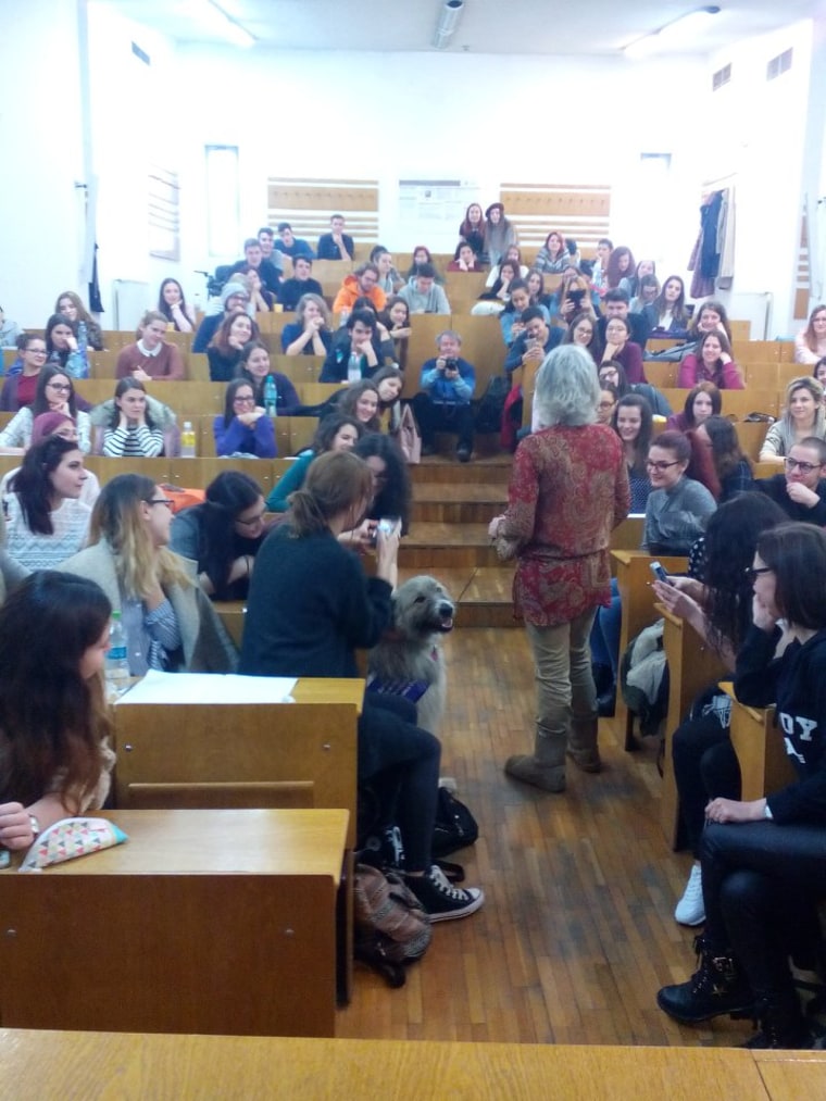 Kratu charms students at a university in Romania, the country where he was born. 