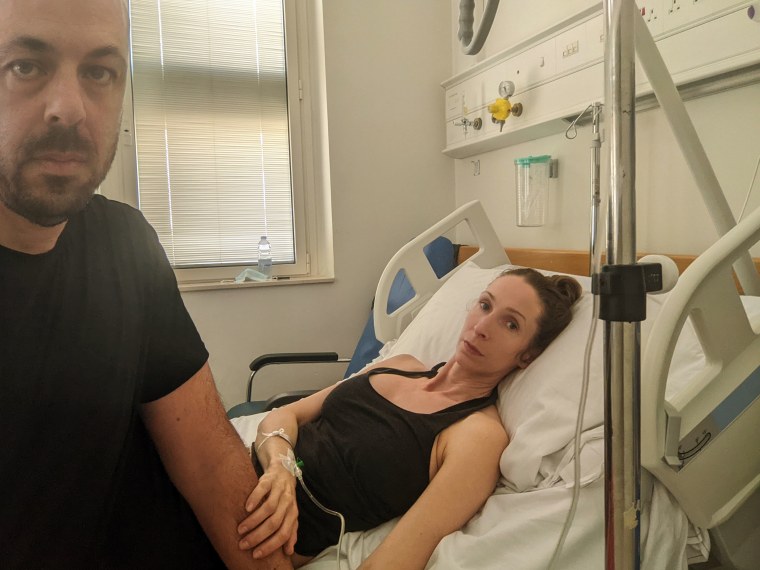 Jay Weeldreyer and his partner, Andrea Prudente, pictured in a hospital in Malta.