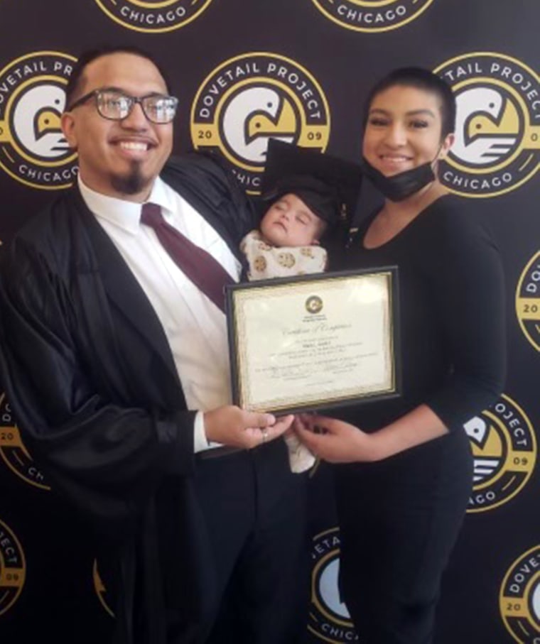 Angel Suarez (with his daughter, Dejà, and wife Dakgma Ojeda) showed off his diploma from The Dovetail Project.
