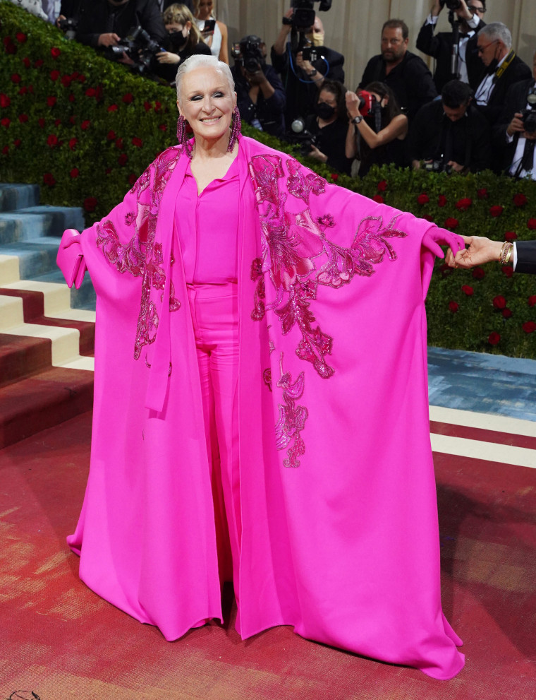 Glenn Close clearly got the memo, showing up to the 2022 MET Gala in head-to-toe hot pink.