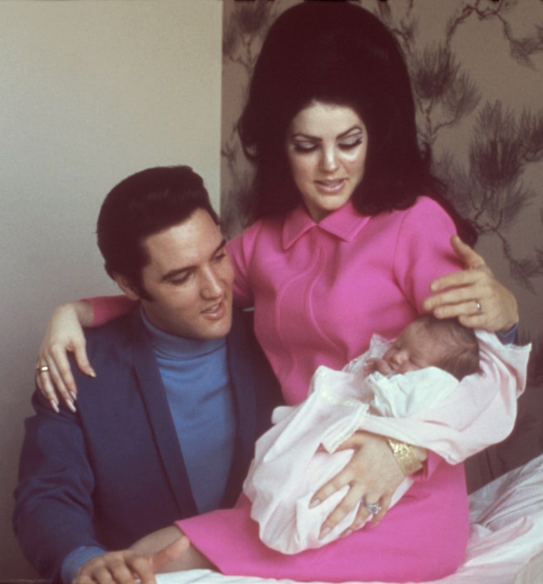 Elvis and Priscilla Presley cradled their newborn daughter, Lisa Marie, in February 1968.