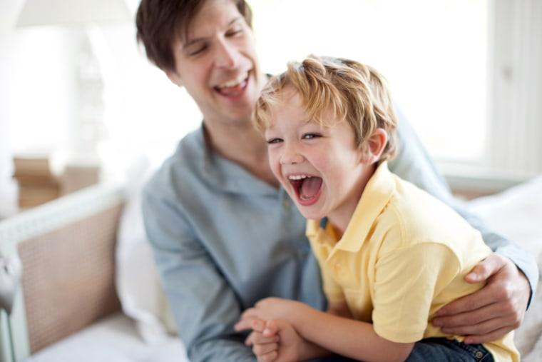 Father and son laughing