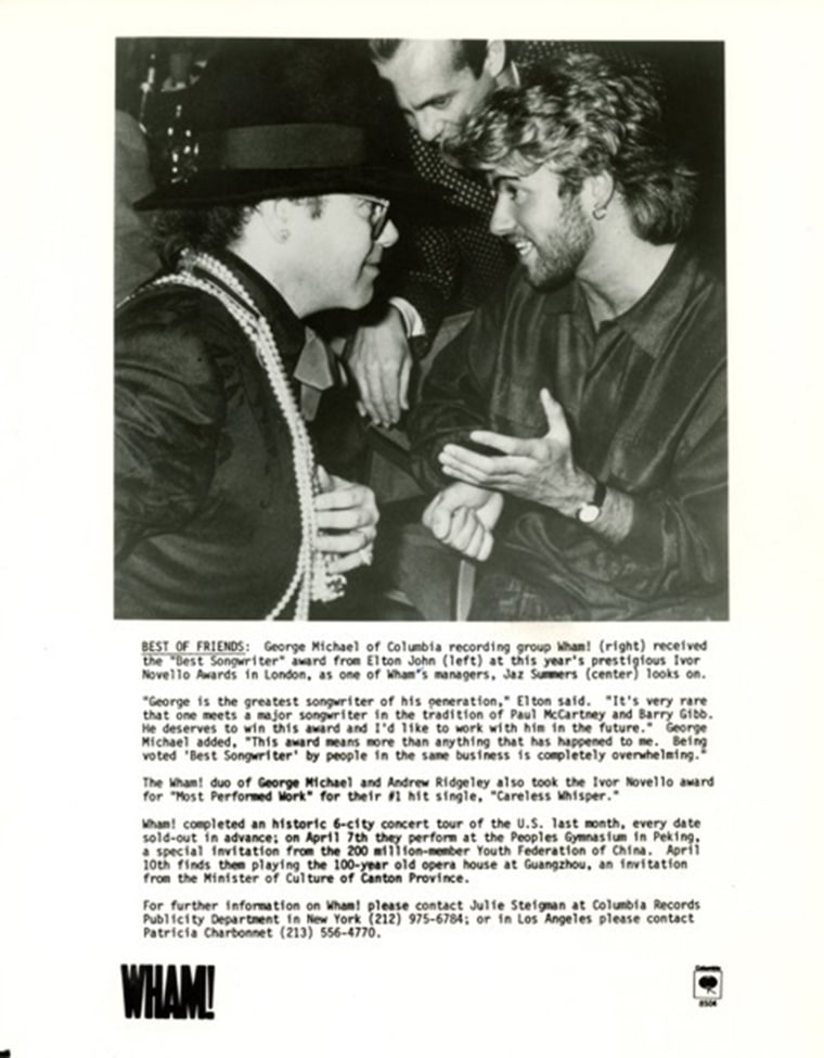 Michael with Elton John.
