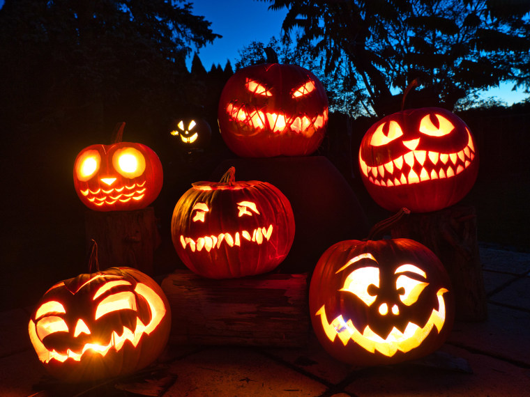 group of candle lit Halloween Pumpkin