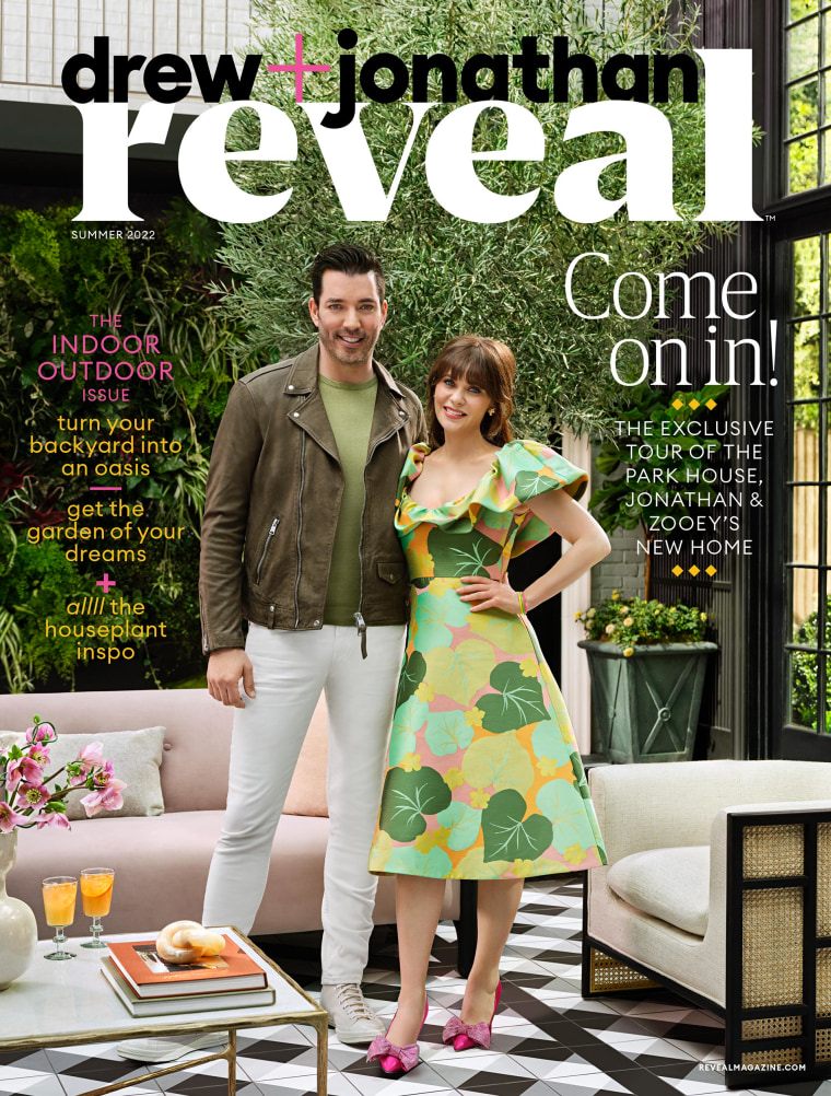 Scott and Deschanel pose in their solarium for the cover of Drew + Jonathan Reveal.