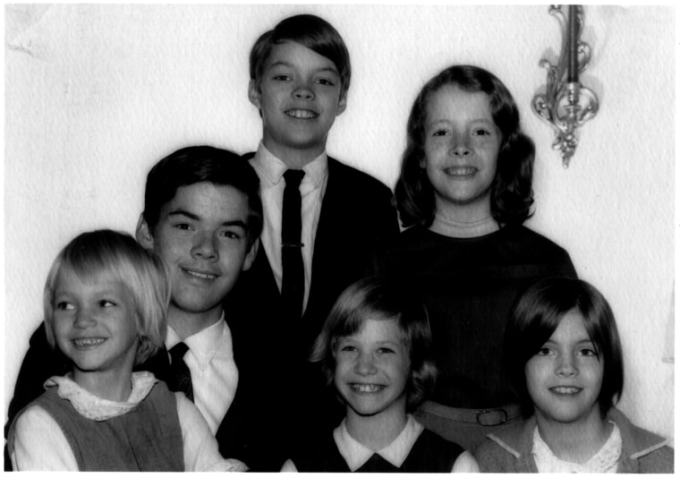 This photo of my siblings and me (center, bottom row) was taken days after our mother abandoned us for a female lover she met in a psychiatric ward.