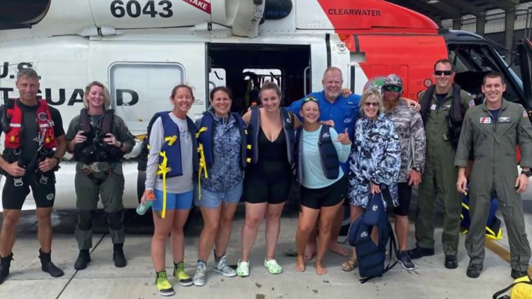 A group of five women and two men were rescued by the Coast Guard about 100 miles off the coast of Florida after their boat was disabled by a lightning strike.