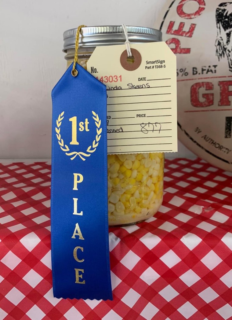 Linda Skeens’ winning canned corn, seen here in the most perfectly Americana photo ever taken.