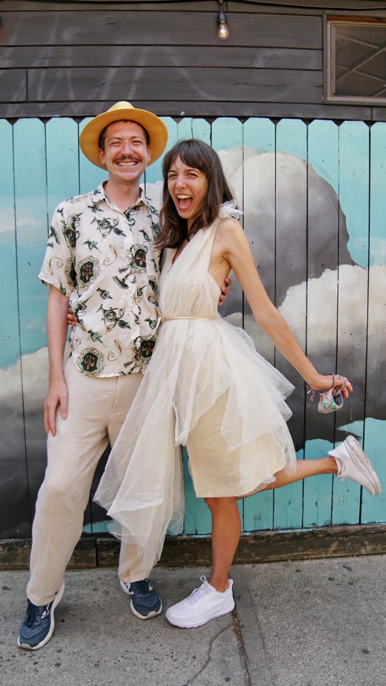 On the last day of their year of marathon walking Mike Varley and Jessi Highet took another 26.2 mile walk where they got married and hosted several receptions. Highet made two wedding dresses for the day from her mother and grandmother's dresses.