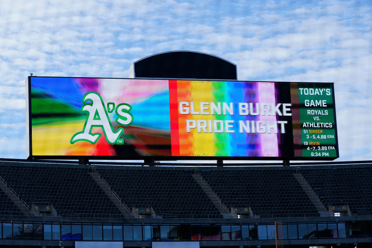 The scoreboard reads Glenn Burke Pride Night at RingCentral Coliseum before a baseball game between the Oakland Athletics and the Kansas City Royals in Oakland, California, on June 11, 2021.