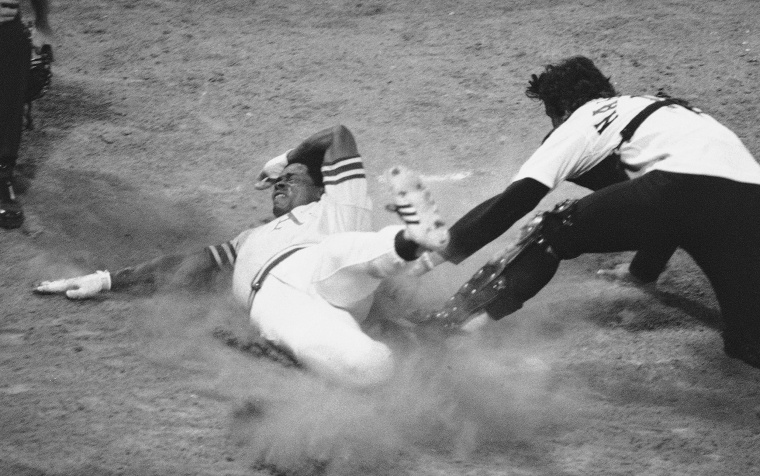 Glenn Burke of the Oakland A's looks the other way as Chicago White Sox catcher Bill Nahorodny applies a belated tag in the fourth inning at Chicago on May 27, 1978. Burke scored from second on Dave Revering's single to right field. Oakland won, 3-1. 