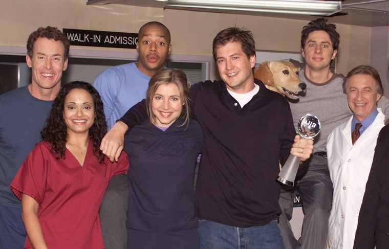 From l.-r.: John C. McGinley, Judy Reyes, Donald Faison, Sarah Chalke, creator and exec. prod. Bill Lawrence, Rowdy (the dog), Zach Braff  and Ken Jenkins at receiving the 2001 TV Land Future Classic Award in 2002.
