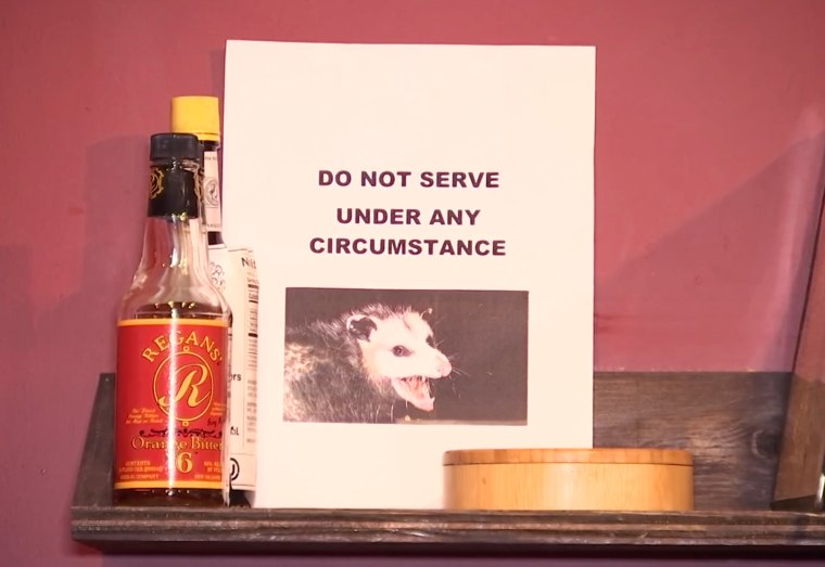 "Do not serve under any circumstance," reads sign at Temkin’s Bar with a photo of an opossum.