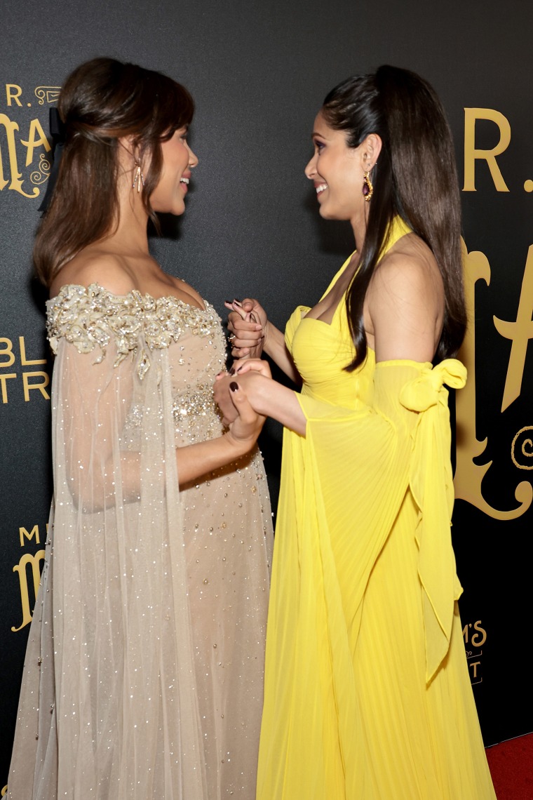 Ashton and her “Mr. Malcolm’s List” co-star Freida Pinto shared a moment on the red carpet.
