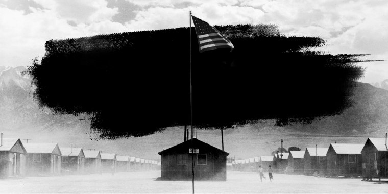 Photo Illustration: A U.S. flag flies at the Manzanar War Relocation Center, a Japanese-American internment camp on July 3, 1942.