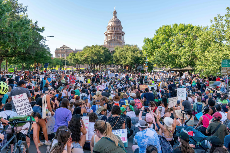 Abortion rights activists march to the Austin State Capitol