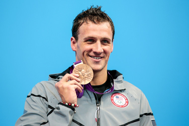 Ryan Lochte stands on the podium during the medal ceremony for the Men's 200m Individual Medley final on Day 6 of the London 2012 Olympic Games on Aug. 2, 2012.