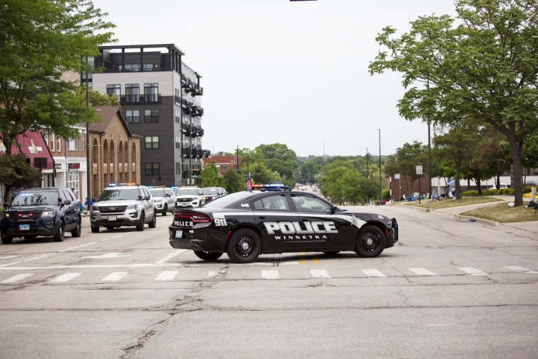 First responders at the scene of a shooting at a Fourth of July parade in Highland Park, Ill.