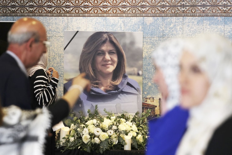Mourners attend a memorial ceremony for Shireen Abu Akleh