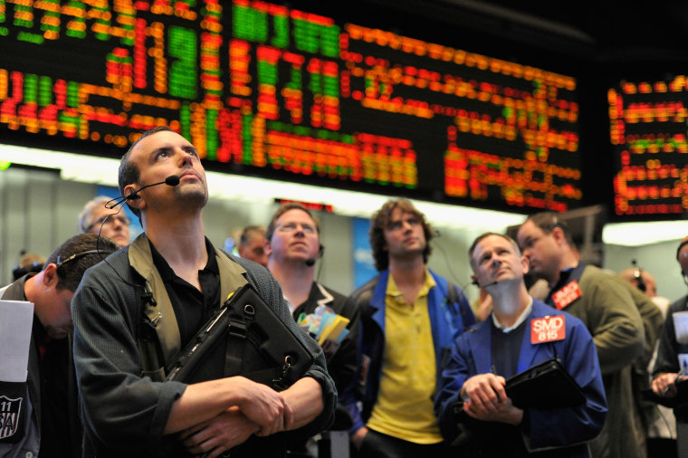 Traders in the 30-year bond options pit in Chicago on April 27, 2011.
