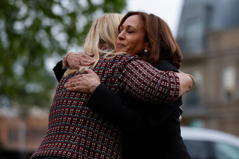 Image: Vice President Kamala Harris hugs Mayor Nancy Rotering during a visit to the site of the shooting in Highland Park, Ill., on July 5, 2022.