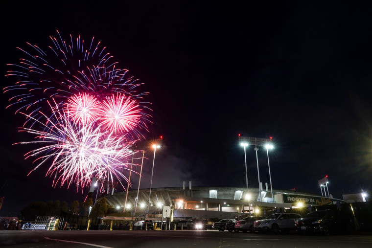 Fireworks erupt over RingCentral Coliseum after a baseball game between the Oakland Athletics and the Toronto Blue Jays in Oakland, Calif., on July 4, 2022.