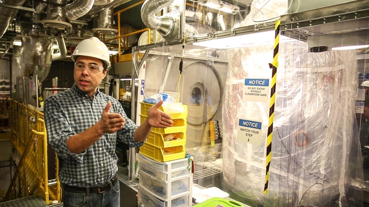 Image: Aaron Manalaysay, the physics coordinator of Lawrence Berkeley National Lab's experiment, explains how the underground detector will interact with dark matter in the Sanford Underground Research Facility in Lead, S.D., on Dec. 8, 2019.