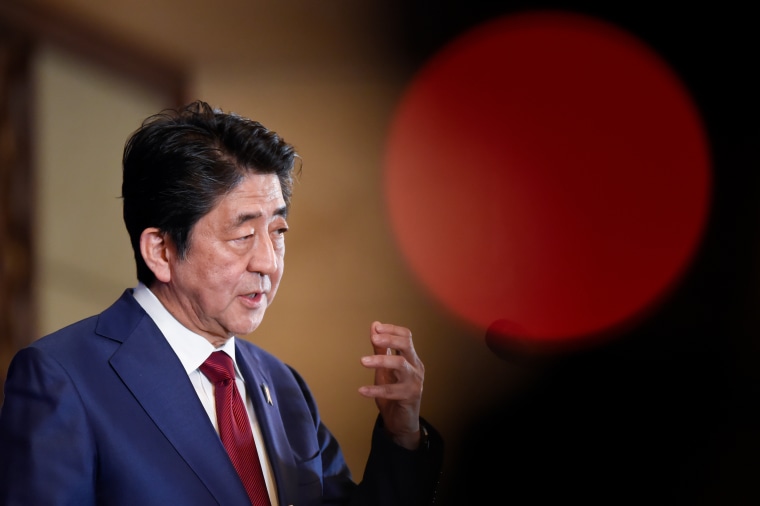 Then-Prime Minister Shinzo Abe answers a question at a press conference at the 8th trilateral leaders' meeting between China, South Korea and Japan in Chengdu, in southwest China's Sichuan province on Dec. 24, 2019.