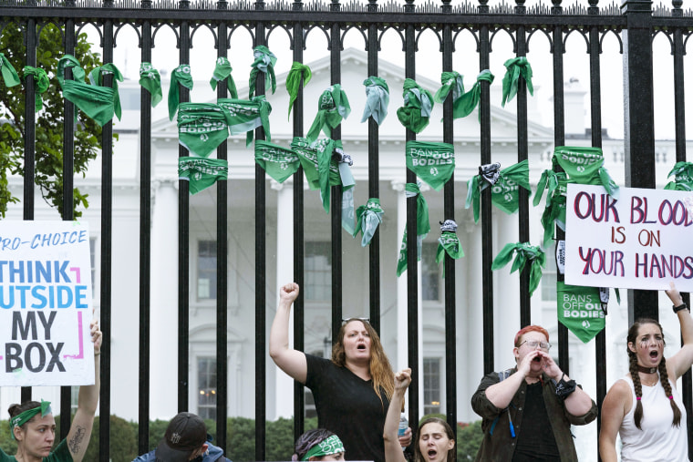 Abortion rights activists protest outside of the White House