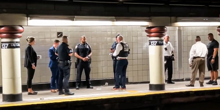 Police respond to the scene of a stabbing at the 137th Street subway station in New York on July 9, 2022.