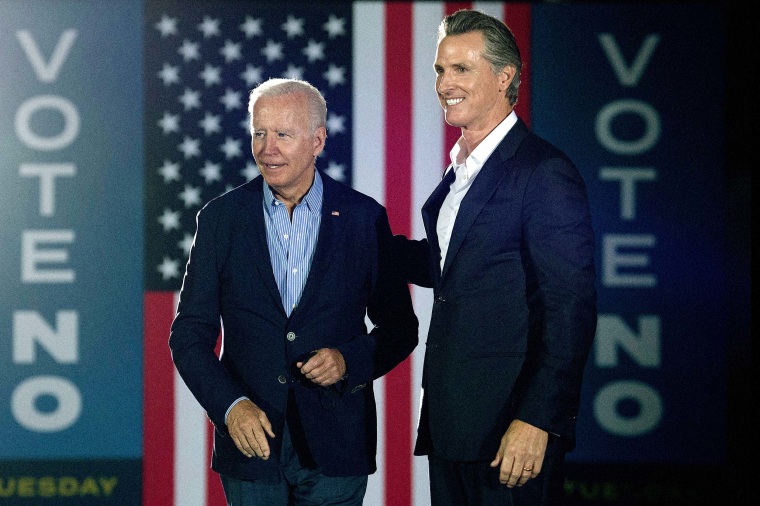 California Governor Gavin Newsom greets US President Joe Biden during a campaign event at Long Beach City College in Long Beach, Calif. on September 13, 2021.