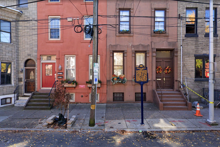 A plaque outside the former home of John C. Asbury, a prominent African American philanthropist, who lived along Christian Street, in Philadelphia, also known as Black Doctors Row.