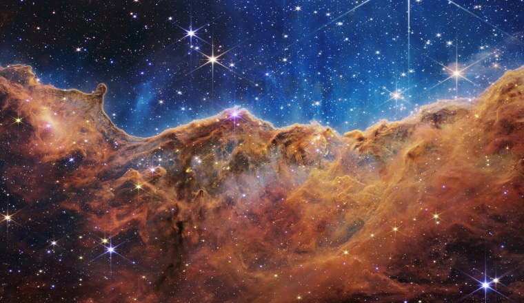 The Webb telescope's view of the Carina Nebula reveals previously invisible areas of star birth.