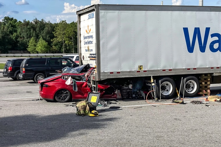 A Tesla that rear-ended a tractor-trailer at a rest area off Interstate 75 killing both the driver and passenger, at the crash site near Gainesville, Fla., July 6, 2022.