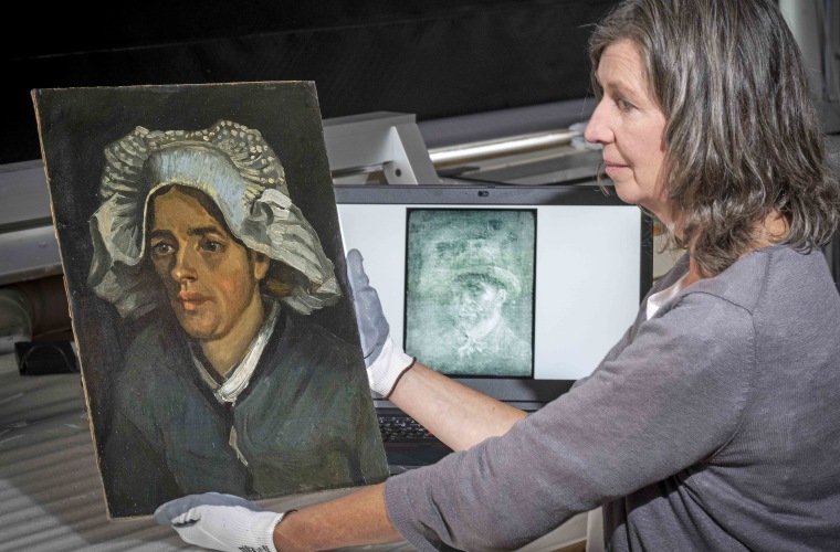 Senior conservator Lesley Stevenson views "Head of a Peasant Woman" alongside an X-ray image of the hidden Van Gogh painting.