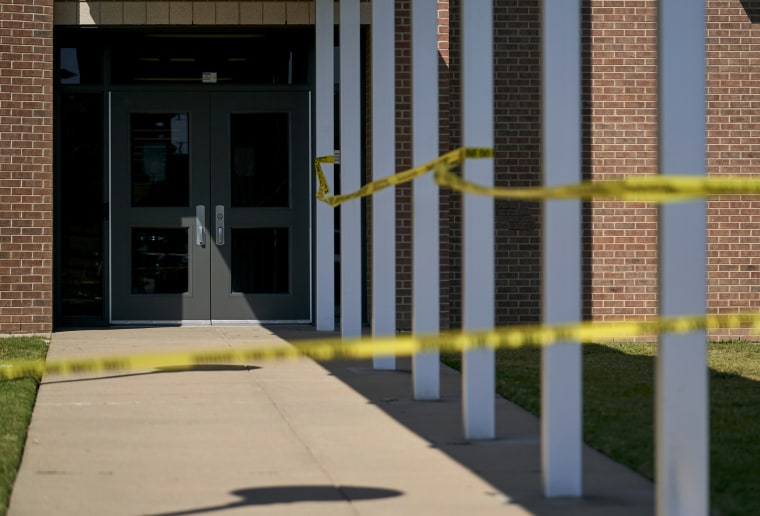 IMage: Police tape outside of the Mansfield Timberview High School in Arlington, Texas, on Oct. 6, 2021.