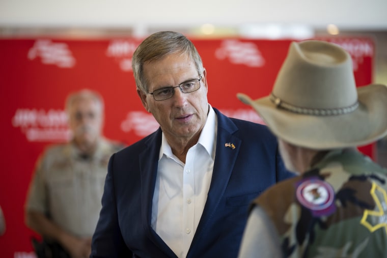 Jim Lamon speaks with supporters before the start of his town hall event at the Combs Performing Art Center in San Tan Valley, Ariz., on July 7, 2022.