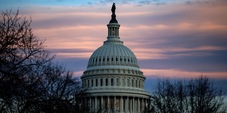 Image: The Capitol building seen at sunset.