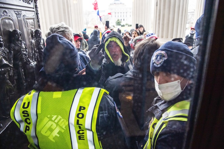 Rioters attempt to enter the Capitol