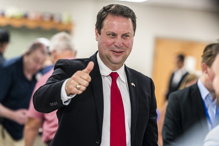Dan Cox greets supporters during a primary election night event on July 19, 2022, in Emmitsburg, Md.