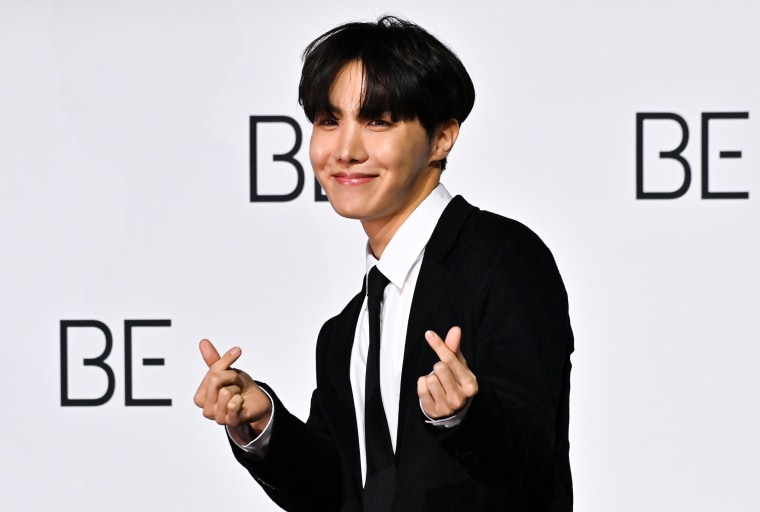 South Korean K-pop boy band BTS member J-Hope poses for a photo session during a press conference on BTS new album 'BE (Deluxe Edition)' in Seoul, on Nov. 20, 2020.